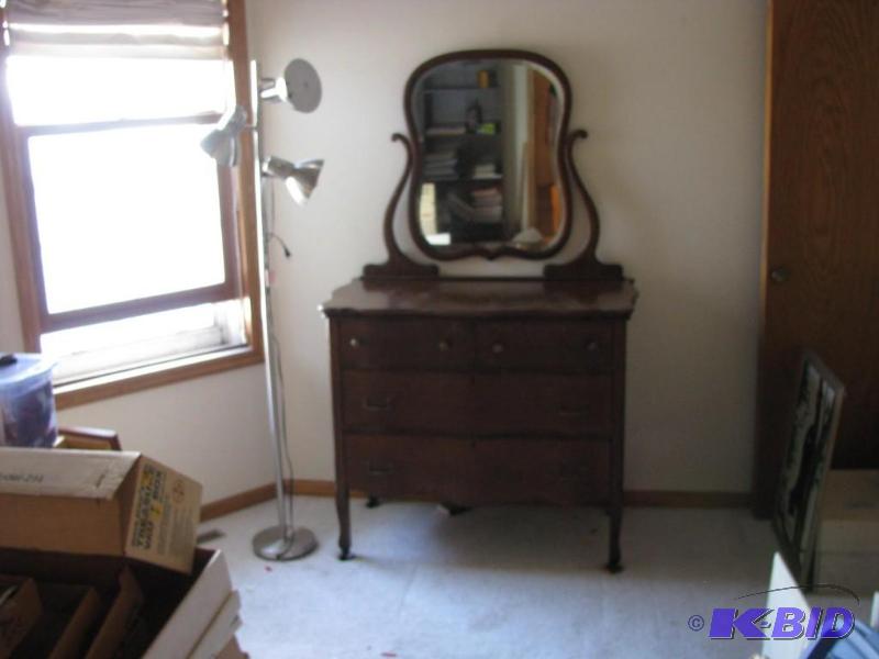lot 1 image: antique bedroom dresser with mirror and wheel...