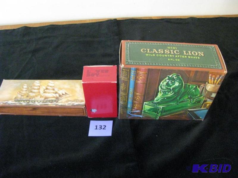 lot 132 image: Vintage Avon bottles with aftershave, cologne...