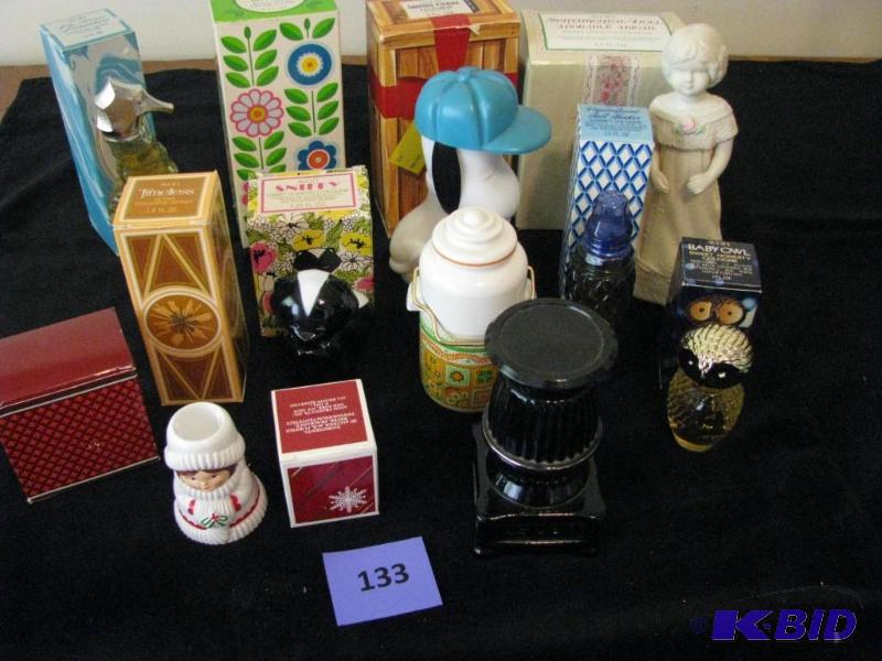lot 133 image: Vintage Avon bottles with cologne. Snoopy, sk...