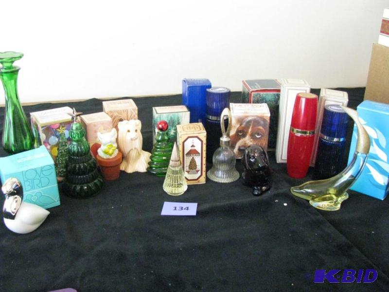 lot 134 image: Vintage Avon bottles with cologne. Dogs, dolp...