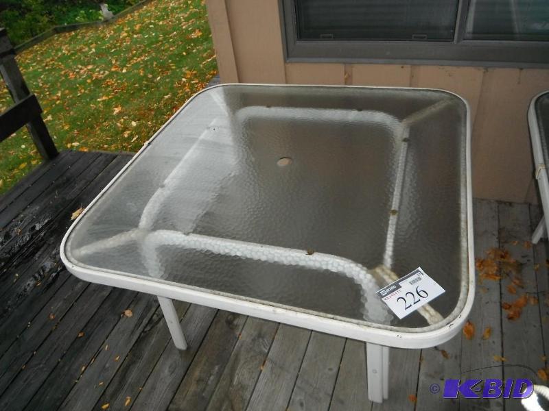 lot 226 image: Outdoor Glass Table wWhite Metal Frame 48&q...