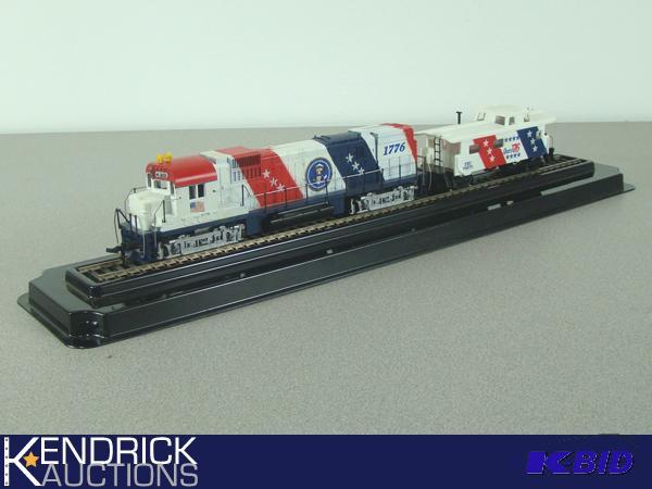 lot 19 image: Mantua-Tyco HO Scale Patriotic Locomotive, and Caboose
