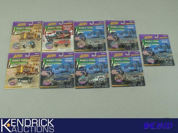 lot 37 image: Lot of 9 - 164 Scale Carded Johnny Lightning Frightning Lightning Die Cast Cars