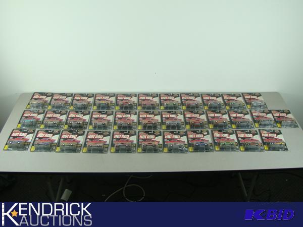 lot 40 image: Lot of 34 Carded 164 Scale Racing Champions Hot Rod Die Cast Cars