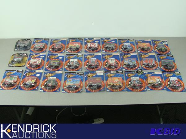 lot 41 image: Lot of 27 Carded 164 Scale Winners Circle Die Cast Cars
