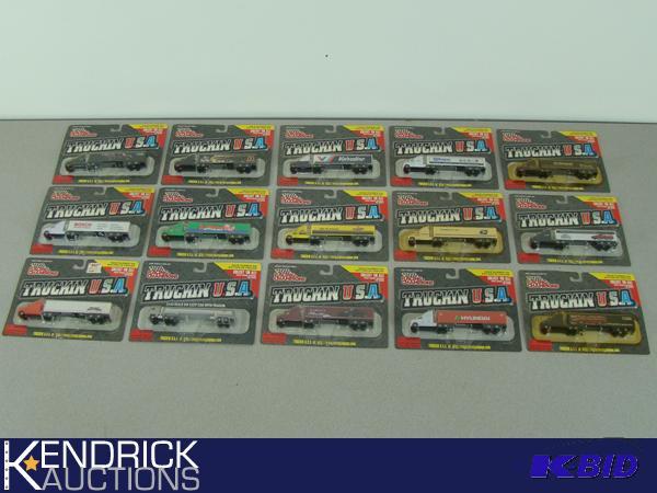 lot 43 image: Lot of 15 Carded 1144 Scale Racing Champions Truckin USA Die Cast Cars