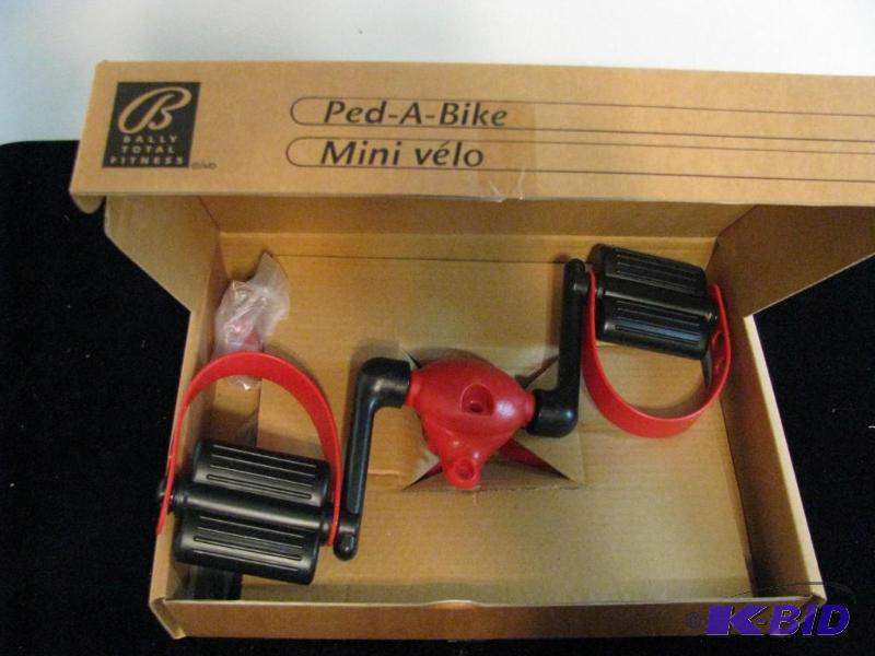 lot 101 image: new in the box Ballys fitness Ped-A-Bike, pe...