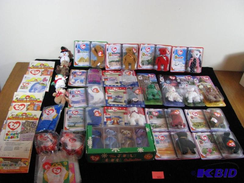 lot 102 image: 25 new in the package McDonalds Beanie babie...