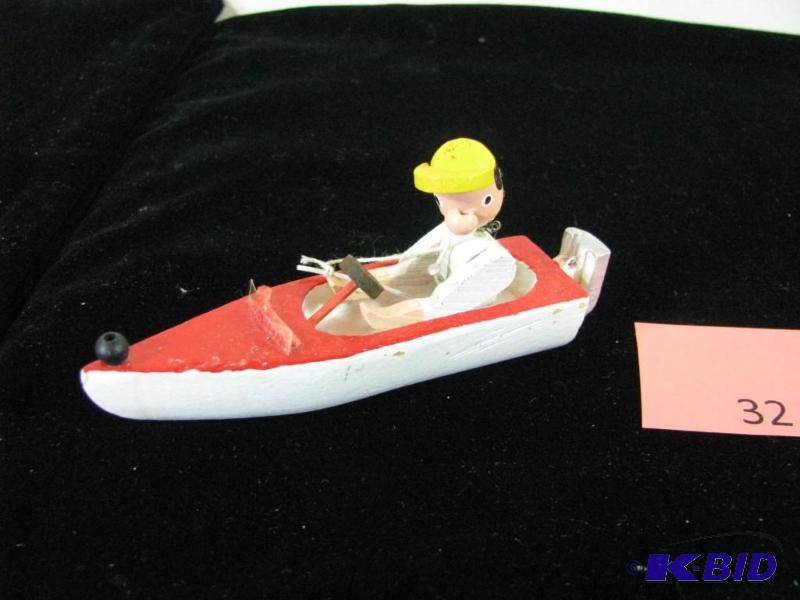 lot 32 image: Vintage wood boat toy, bobble head man, unusu...