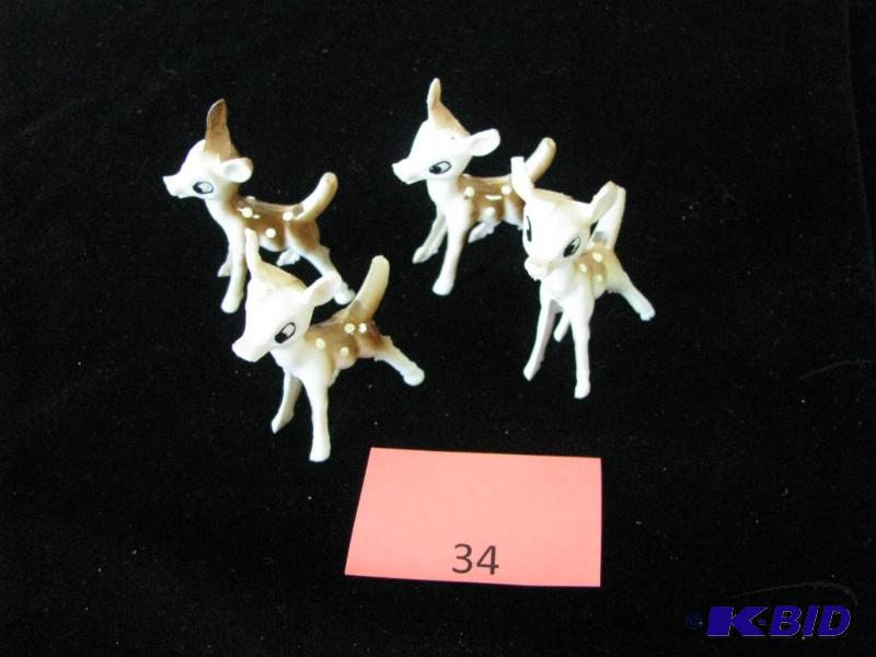 lot 34 image: Vintage toy, 4 baby deer, hand painted plasti...