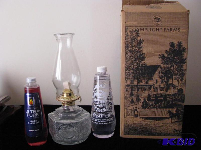 lot 57 image: Lamplight Farms glass oil lamp with two bottl...