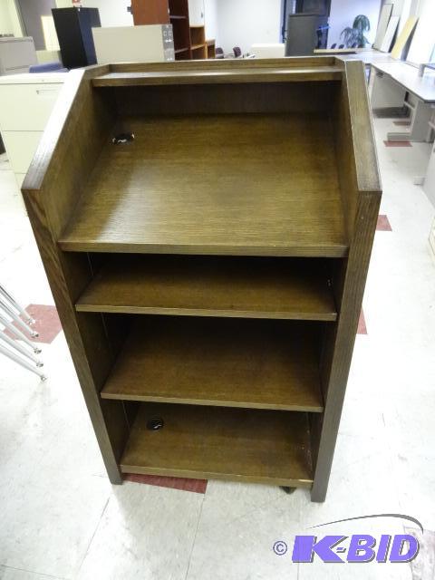 Wood podium on wheels. Very solid and in very...