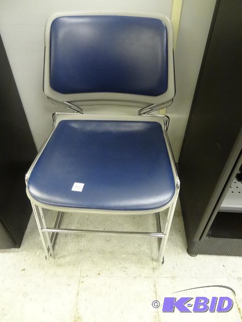 2 metal framed stack chairs...