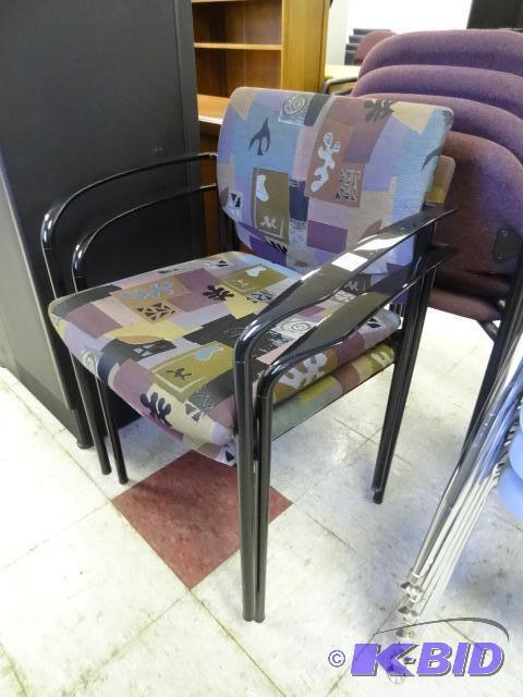 2 matching metal framed stack chairs...