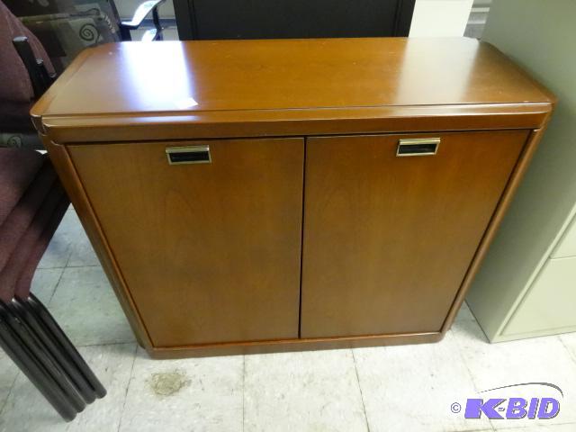 2 door wood cabinet. 1 shelf. 36 x 15 x 29...