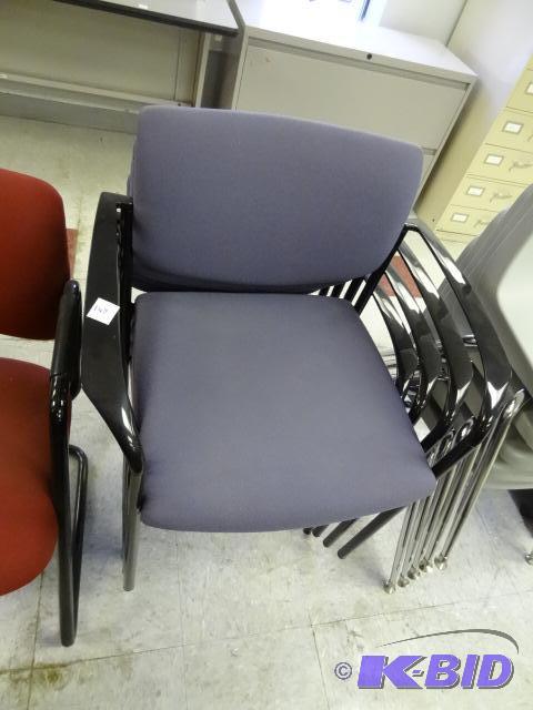 4 matching metal framed stack chairs...
