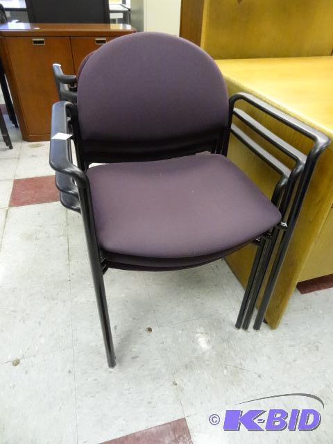 3 matching metal framed stack chairs...