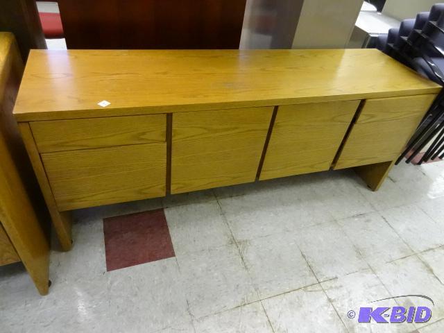 Wood office credenza. 4 drawer and 2 doors...
