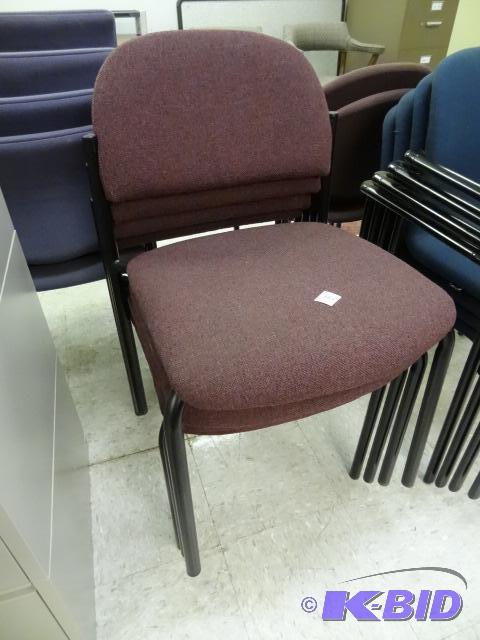 4 matching metal framed stack chairs...