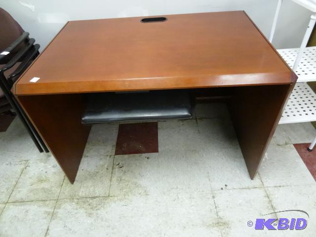 Wood office desk with pull out keyboard tray....