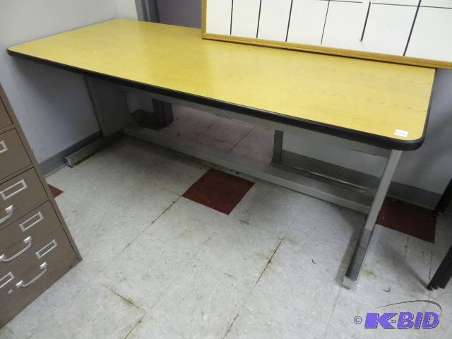 Adjustable height metal framed table. 72 x 30...