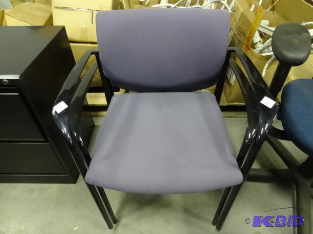 2 matching metal framed stack chairs...