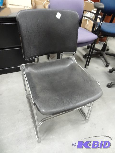 2 metal framed stack chairs...