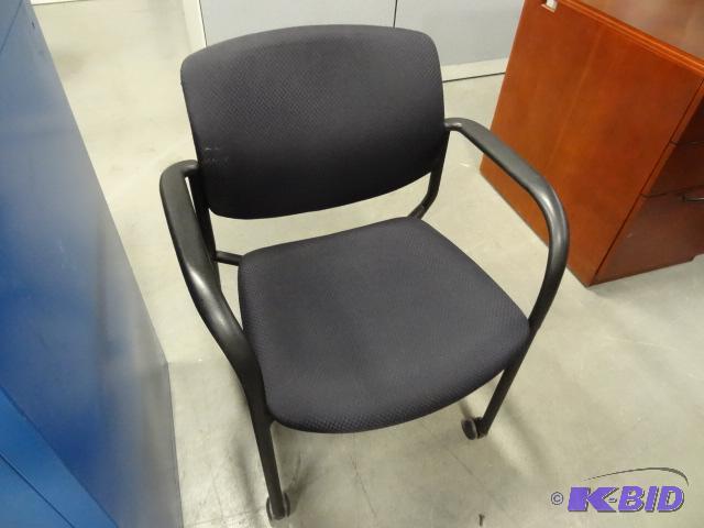 Metal framed side chair on wheels...