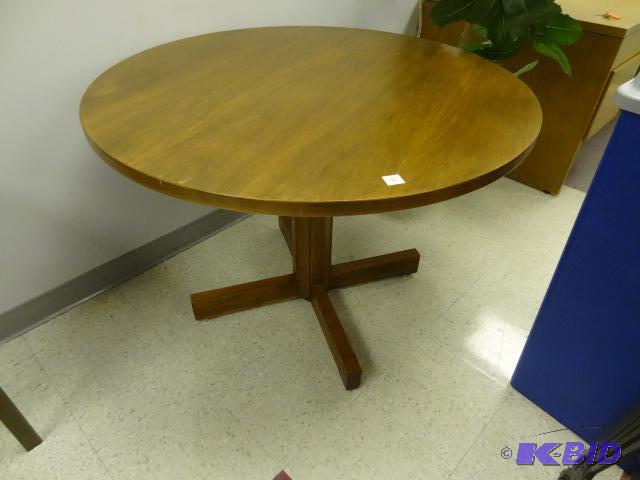 Wood round table. 42&quot...