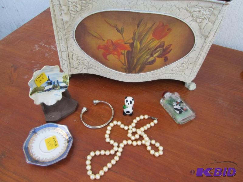 lot 107 image: mixed lot of jewelry and decorations pandas...