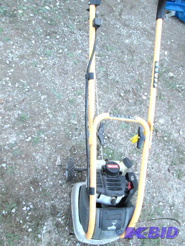lot 120 image: tiller ryobi brand gas cold start tiller...