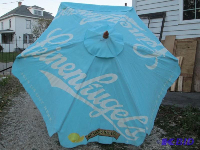 lot 131 image: Leinenkugels patio table umbrella...