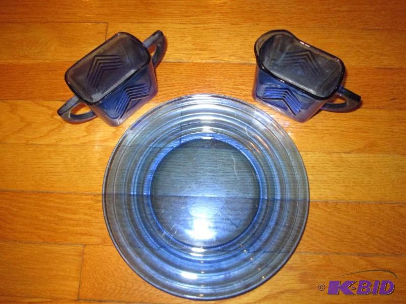 lot 141 image: Blus glass plate with blue glass creamer and ...