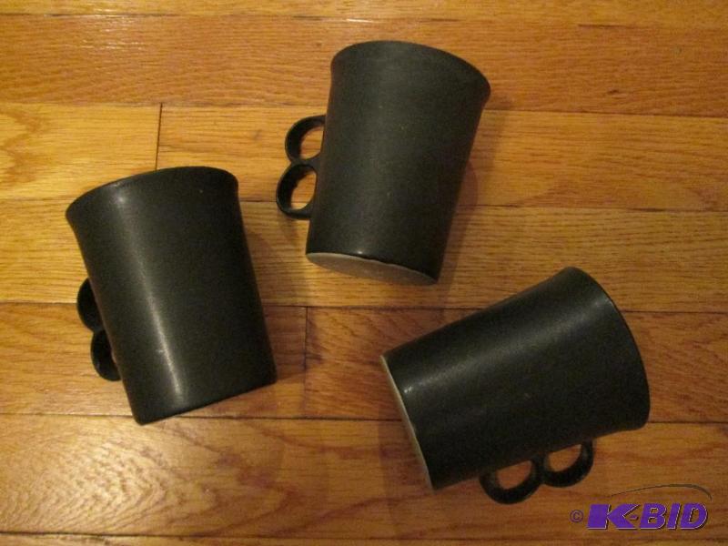 lot 142 image: set of 3 black coffee mugs with two finger ho...