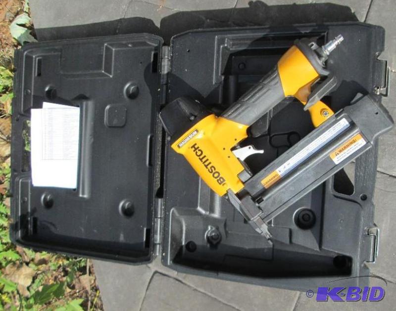 lot 15 image: Bostich Magnesium air powered nail gun...