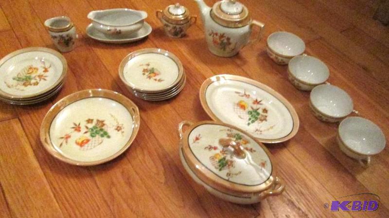 lot 153 image: china tea set, 4 tea cups, 1 teapot, creamer,...