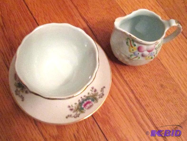 lot 160 image: tea cup, plate and creamer cup set...