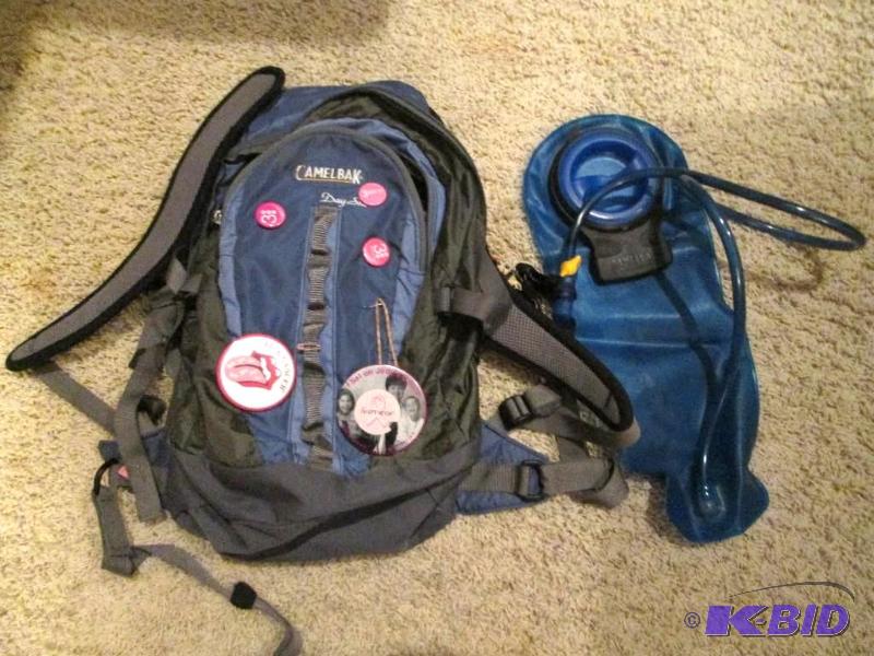 lot 185 image: Camelpak backpack with water bottle hose grea...