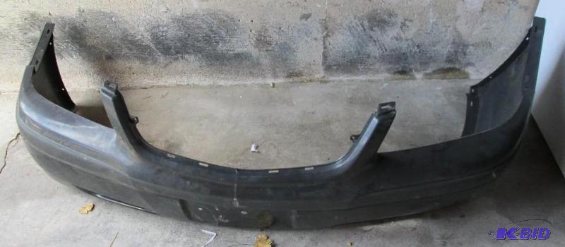 lot 2 image: Front bumper off a 2001 Chevy Impala, Grey co...