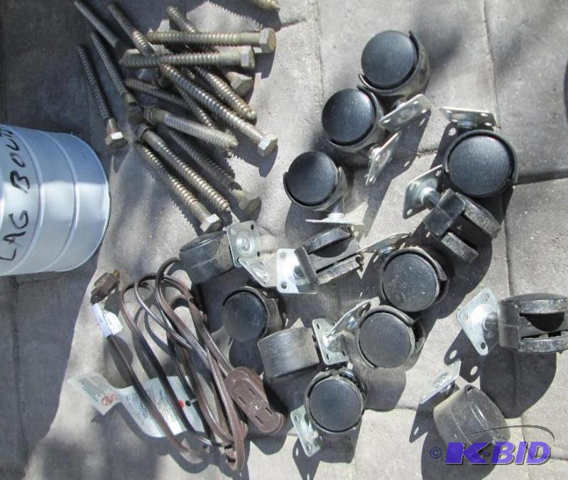 lot 25 image: Can of caster wheels, self taping hex bolts a...