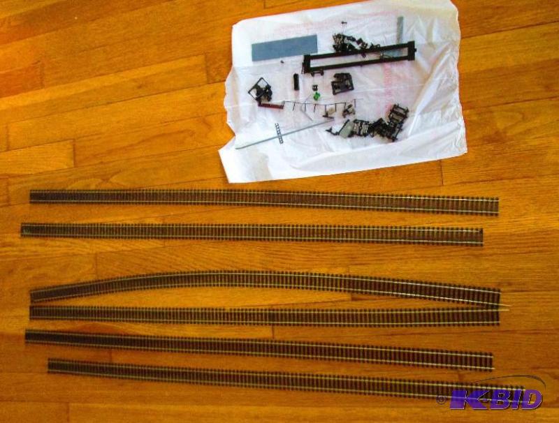 lot 281 image: Model Train tracks and misc parts and pieces...