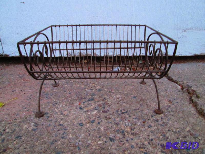 lot 408 image: Metal Holder- 14 inches across...