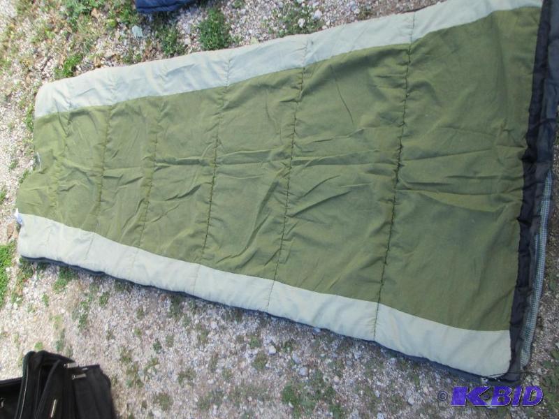 lot 73 image: Green 2 tone sleeping bag by Eddie Bauer...