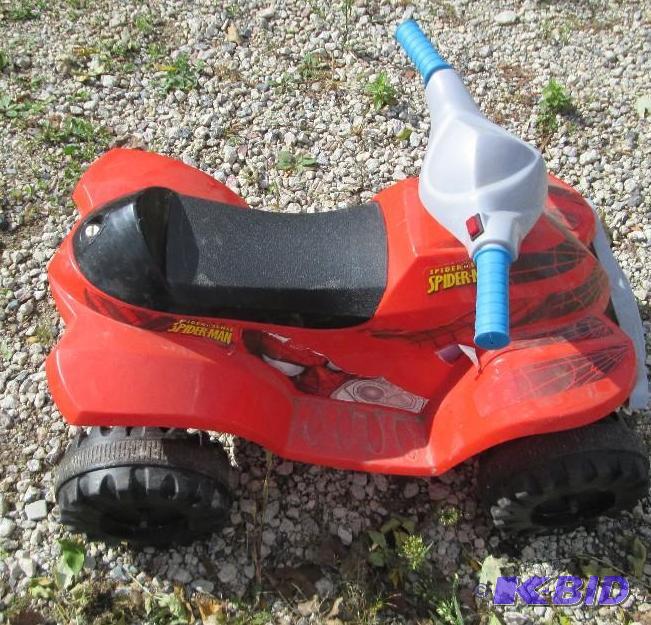 lot 9 image: Spiderman powered kids 4 wheeler, battery and...
