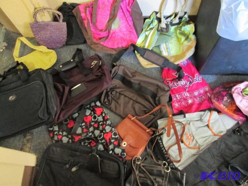 Large lot of assorted purses and bags...