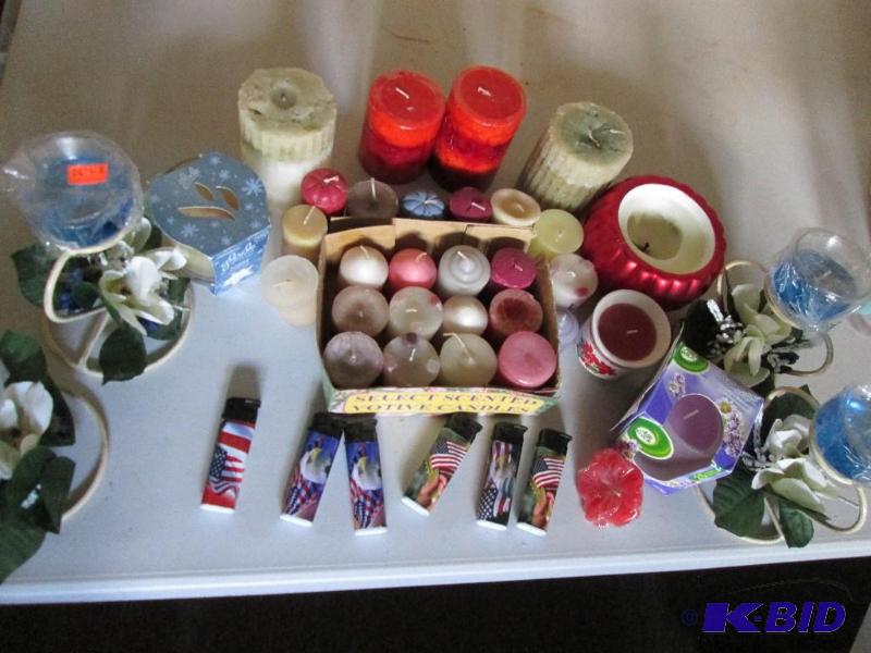 Lot of candles and holders...
