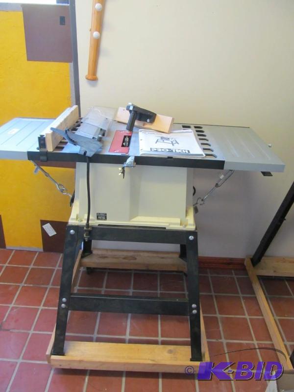 lot 1 image: Pro Tech 10 table saw with stand and stacked dado cutter like new  see pictures relisted do to no show
