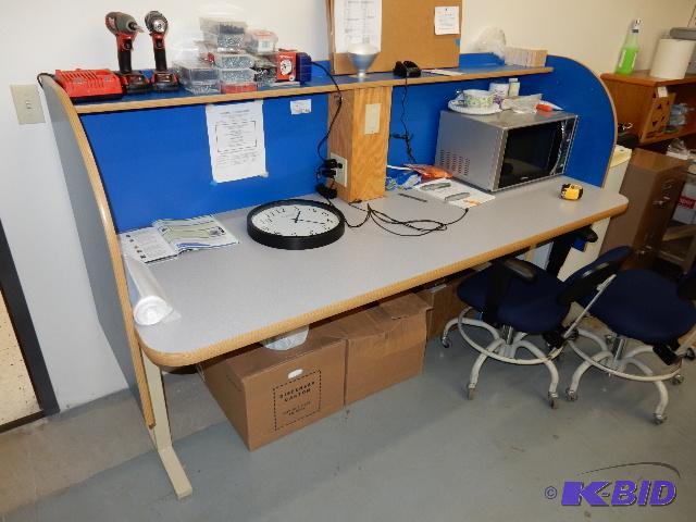 CounterDesk with rounded end pieces that pro...