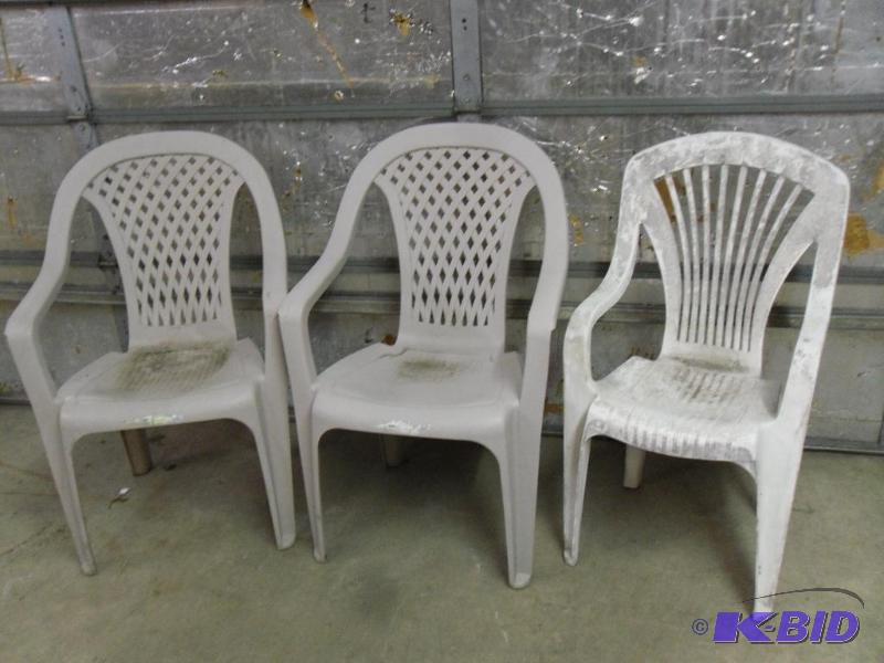 Lot of 3 Plastic Outdoor Chairs. One needs ma...