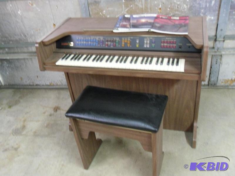 Lowrey Organ with Bench and Music. Model Geni...